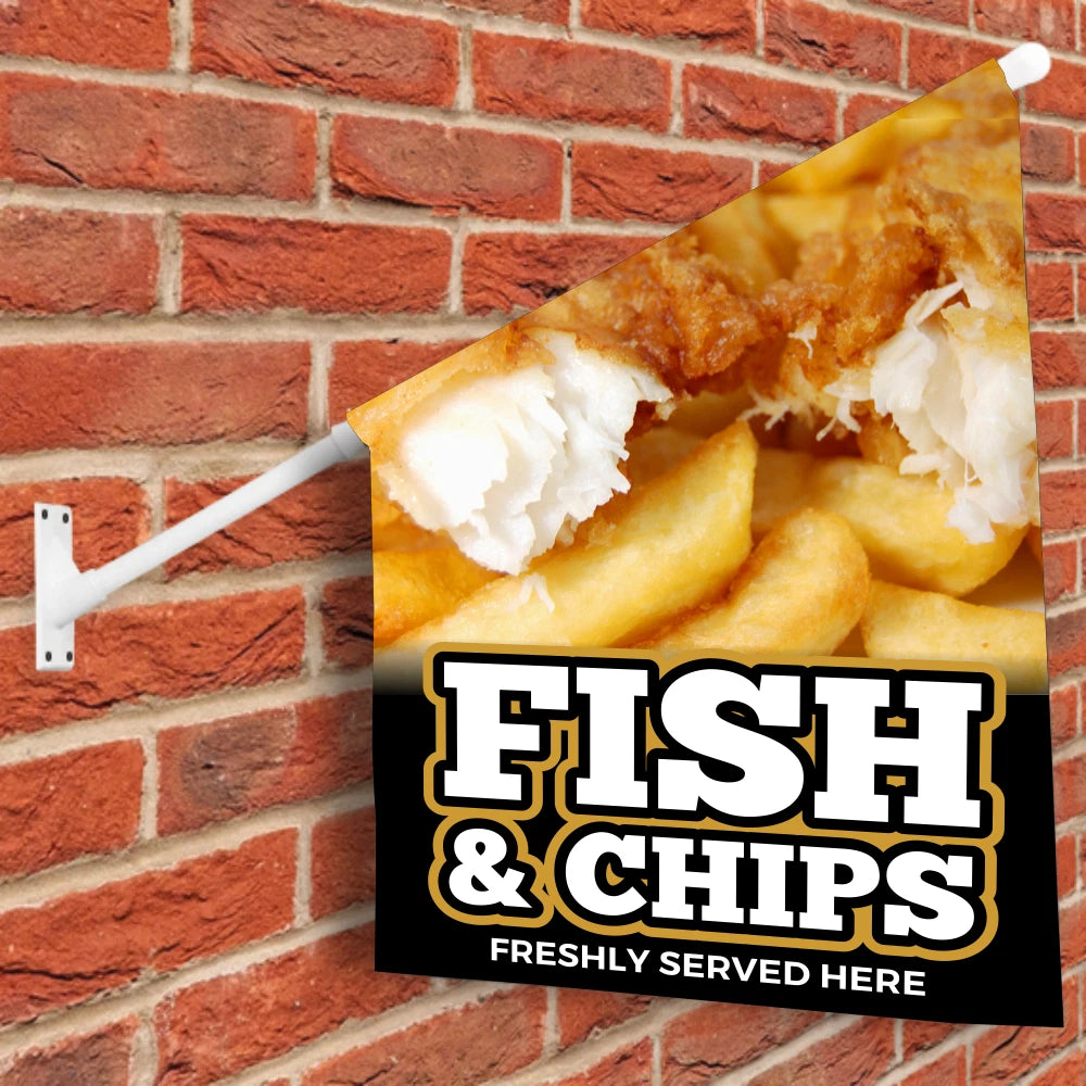 Fish and chips flag sign on a brick wall