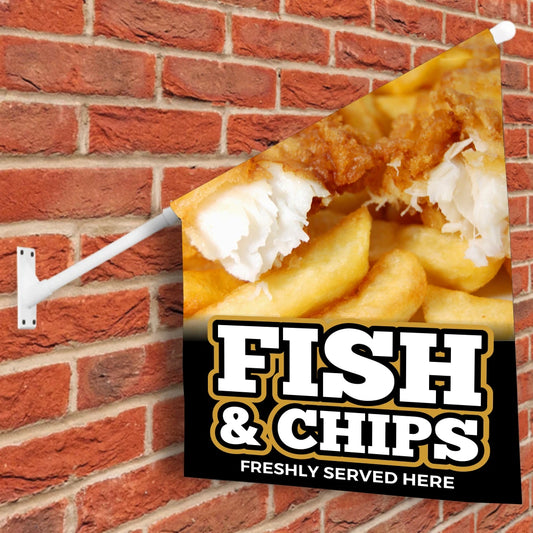 Fish and chips flag sign on a brick wall
