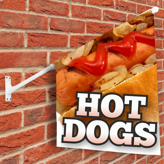 Hot dog wall flag with toppings on a bun against a brick wall, with 'HOT DOGS' text.