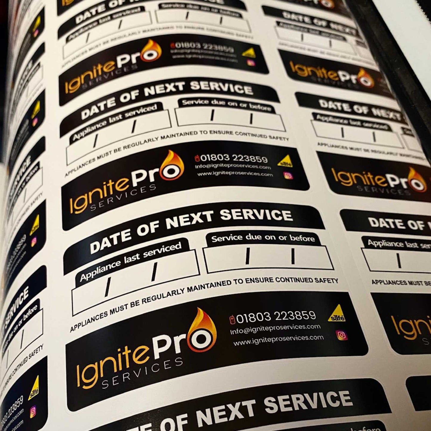 Next service due stickers for boilers and appliances showing service reminder information for plumbing and heating engineers