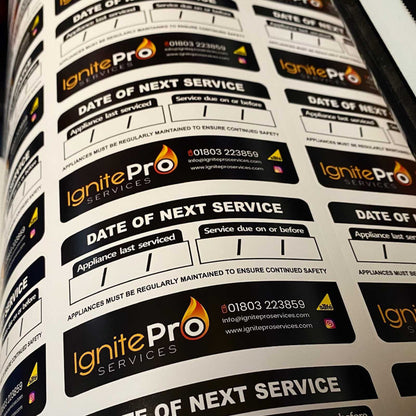 Next service due stickers for boilers and appliances showing service reminder information for plumbing and heating engineers