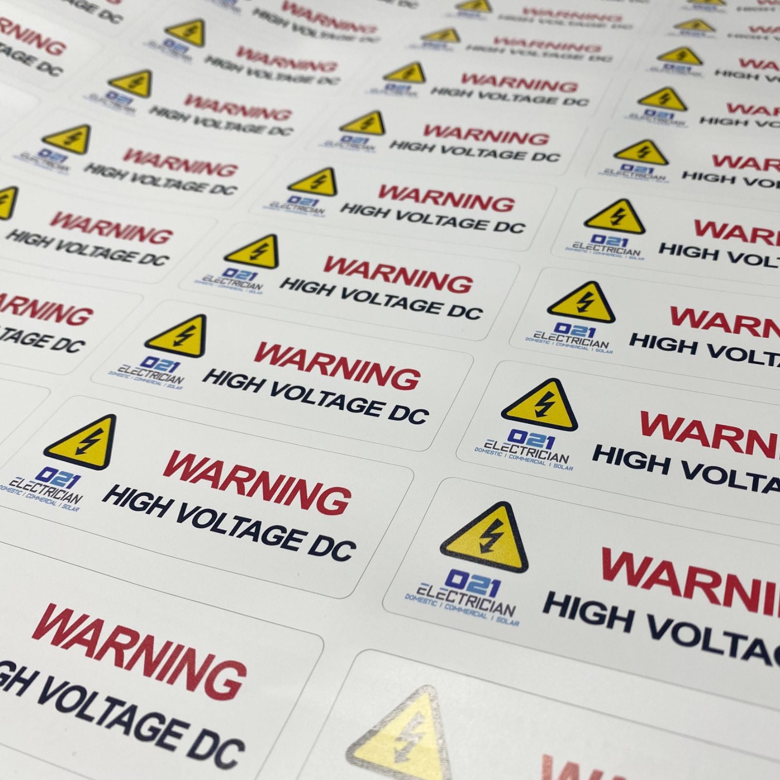 High voltage DC safety labels sized 90x32mm for solar PV inverters, isolators and electrical enclosures