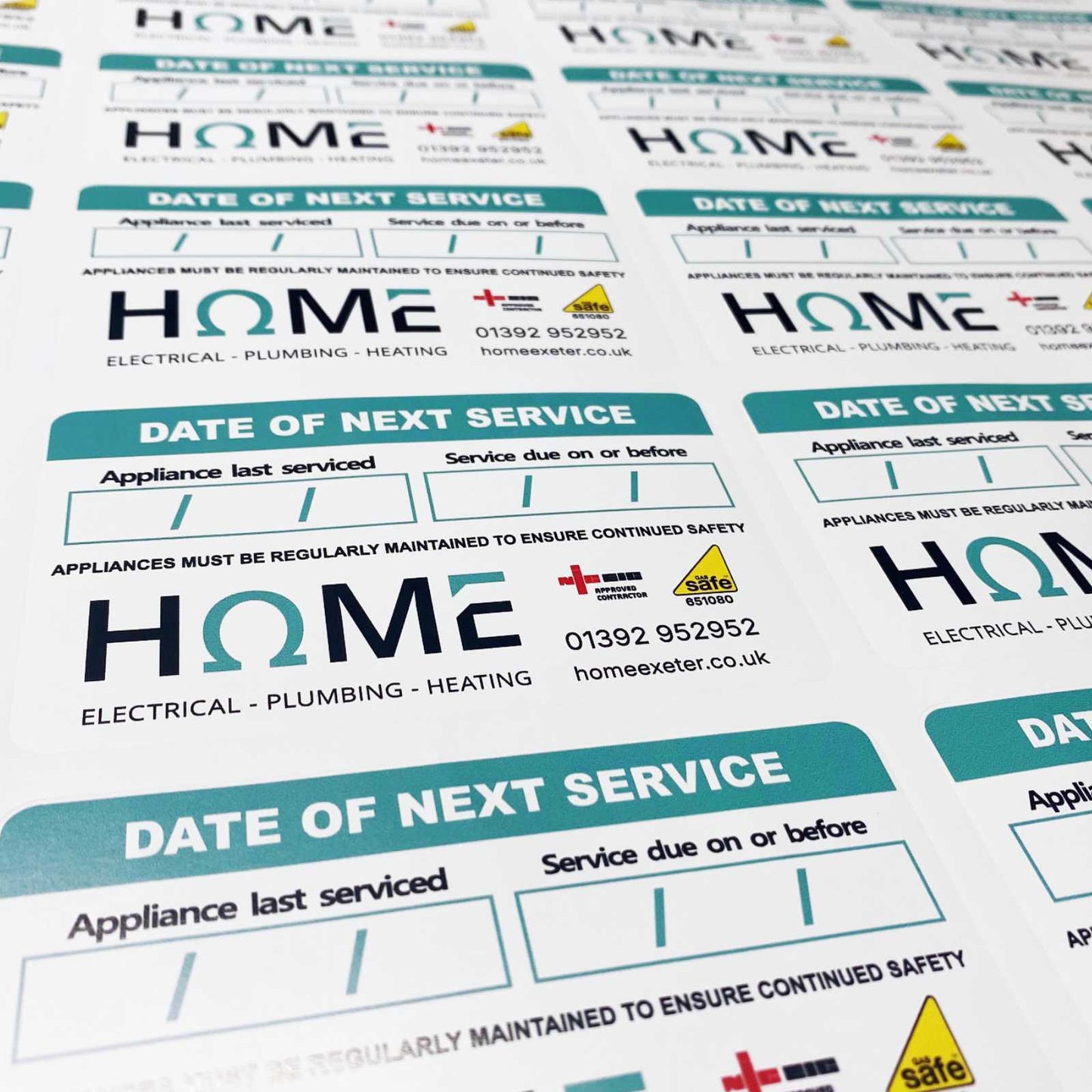 Next service due stickers for plumbing and heating engineers showing service reminder information on boilers and appliances