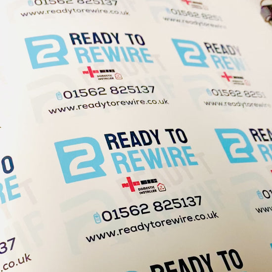Custom business details vinyl labels showing personalised self-adhesive stickers with company logo and contact information