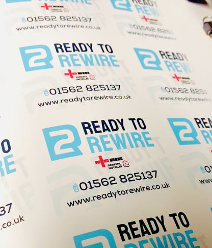 Custom business details vinyl labels showing personalised self-adhesive stickers with company logo and contact information