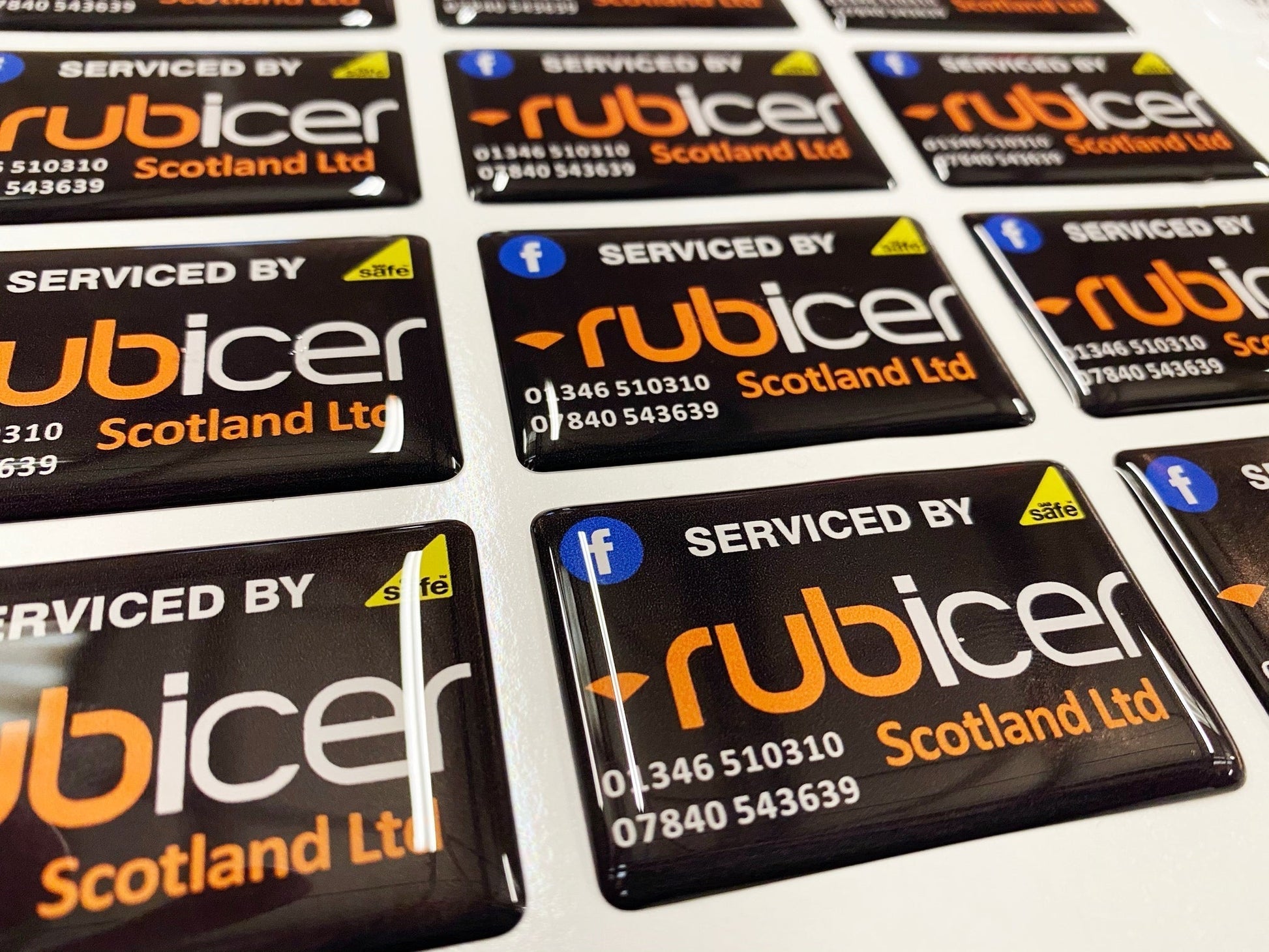 Scratch-resistant domed labels for plumbing businesses
